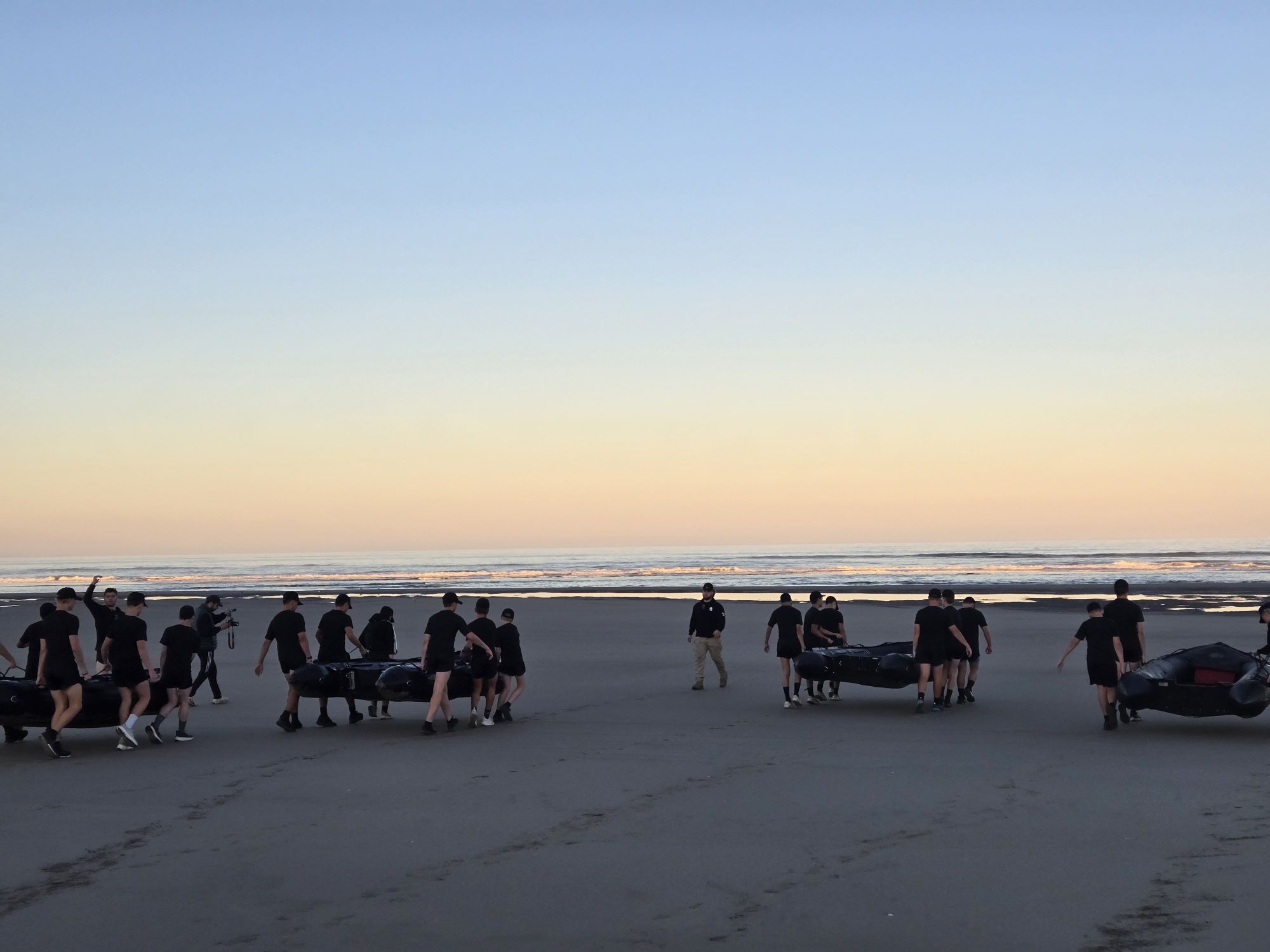 Spartan course trainees under load