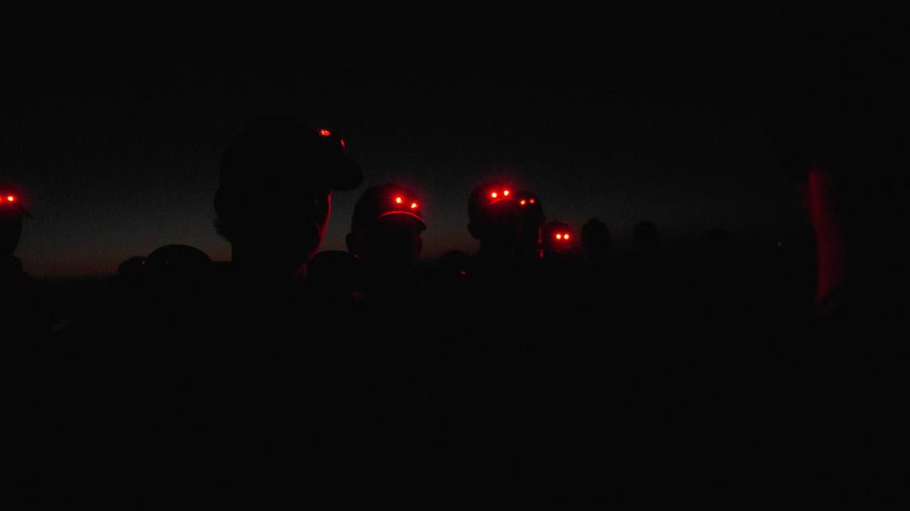 Spartan course team together in the field